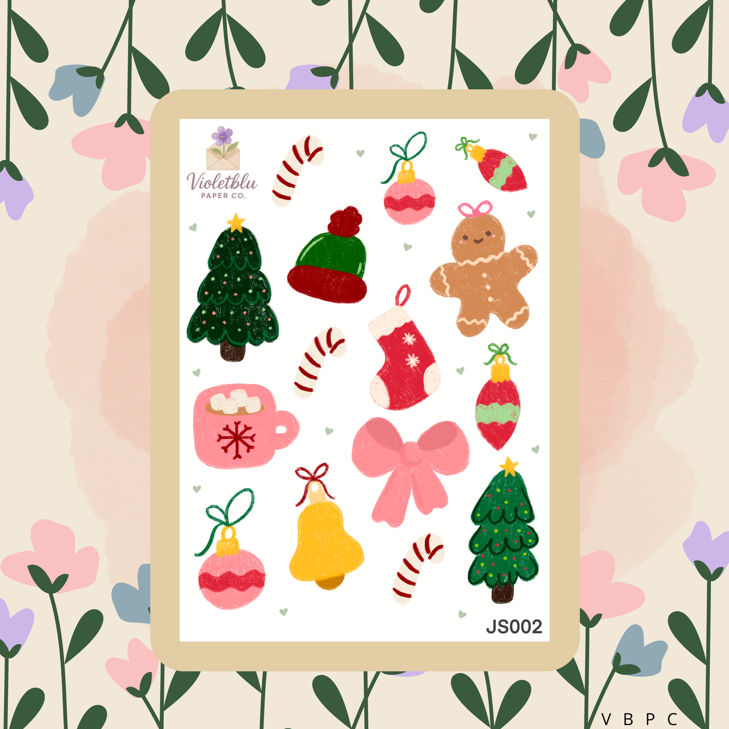 Sheet of Christmas-themed stickers with decorative elements on a floral background